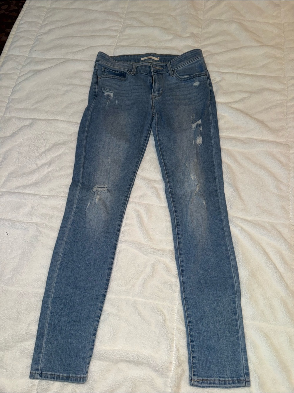 Women’s Distressed Mid-Blue Skinny Jeans